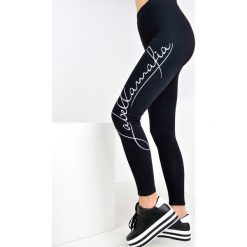 Legginsy we wzory: Czarne legginsy z napisem