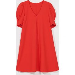Sukienka typu baggy -. Sukienki damskie Mohito, bez wzorów, bez kołnierzyka, bez rękawów. W wyprzedaży za 79,99 zł.