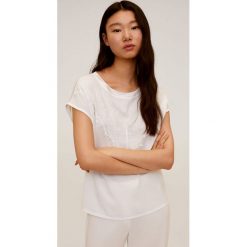 Mango - T-shirt Blonde. Czarne bluzki damskie Mango, s, z aplikacjami, z poliesteru, casualowe, z okrągłym kołnierzem, z krótkim rękawem. Za 79,90 zł.