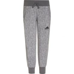 Adidas Performance Spodnie treningowe light solid grey/grey three/black. Różowe spodnie chłopięce marki adidas Performance, z dzianiny, z okrągłym kołnierzem. W wyprzedaży za 127,20 zł.