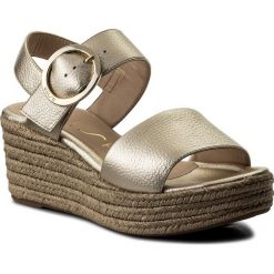 Espadryle UNISA - Kacera Platino. Żółte espadryle damskie Unisa, bez wzorów, ze skóry ekologicznej, bez obcasa, na obcasie. W wyprzedaży za 269,00 zł.