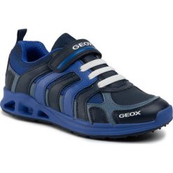 Sneakersy GEOX - J Dakin B. C J949FC 0CE11 C4226 DD Navy/Royal. Niebieskie trampki chłopięce Geox, bez wzorów, ze skóry ekologicznej, na rzepy. W wyprzedaży za 169,00 zł.