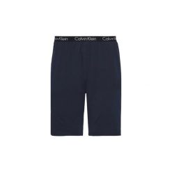 Szorty i Bermudy Calvin Klein Jeans 000NM1226E SHORTS. Niebieskie spodenki i szorty męskie Calvin Klein Jeans, s, bez wzorów, z jeansu. Za 140,53 zł.