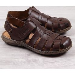 Sandały męskie na rzep brązowe Rieker 22074-25. Pomarańczowe sandały męskie Rieker, bez zapięcia. Za 188,99 zł.