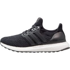 Adidas Performance ULTRABOOST Obuwie do biegania treningowe black. Czarne buty damskie do biegania adidas Performance, z tworzywa sztucznego. W wyprzedaży za 305,55 zł.