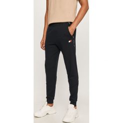Tommy Sport - Spodnie. Niebieskie spodnie męskie Tommy Sport, s, z nadrukiem, z bawełny, sportowe. Za 399,90 zł.