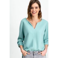 Koszulka w kolorze turkusowym. Niebieskie koszulki damskie Garcia, xl, bez wzorów, bez kołnierzyka. W wyprzedaży za 55,95 zł.