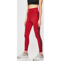 Adidas - Legginsy. Czerwone spodnie damskie Adidas, s, bez wzorów, z elastanu. Za 179,90 zł.
