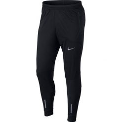 Spodnie do biegania męskie NIKE SHIELD PANT / 859234-010. Spodnie męskie Nike, m, bez wzorów. Za 229,99 zł.