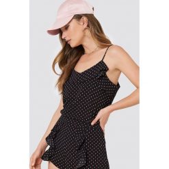 Rut&Circle Top na ramiączkach z falbanką Ferry - Black,Multicolor. Czarne topy damskie Rut&Circle, bez wzorów, z poliesteru, z falbankami. W wyprzedaży za 41,98 zł.
