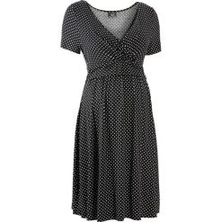 Sukienka ciążowa i do karmienia, shirtowa, krótki rękaw bonprix czarno-biały w kropki. Czarne sukienki mini damskie marki bonprix, na lato, w kropki, moda ciążowa, z krótkim rękawem. Za 54,99 zł.