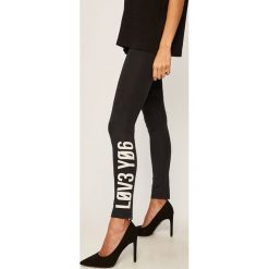 Red Valentino - Legginsy. Czarne spodnie damskie Red Valentino, s, z nadrukiem, z elastanu. W wyprzedaży za 799,90 zł.