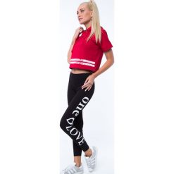Legginsy z napisem na nogawce czarne 7899. Czarne legginsy we wzory marki Fasardi, m. Za 31,20 zł.