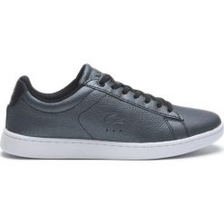 Lacoste Tenisówki Czarny. Czarne trampki i tenisówki damskie Lacoste, bez wzorów, ze skóry, bez zapięcia. Za 464,95 zł.