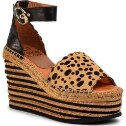 Espadryle KANNA - 20KV20234 Pony Leopardo/Lady Negro. Pomarańczowe espadryle damskie Kanna, bez wzorów, ze skóry, bez obcasa, na obcasie. Za 679,00 zł.