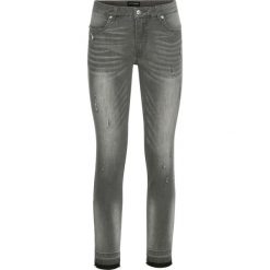 Dżinsy ze stretchem 7/8 SKINNY bonprix jasnoszary "used". Szare jeansy damskie bonprix. Za 129,99 zł.
