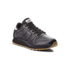 SKECHERS 699. Czarne buty sportowe damskie Skechers, bez wzorów, ze skóry ekologicznej, sportowe. Za 229,99 zł.