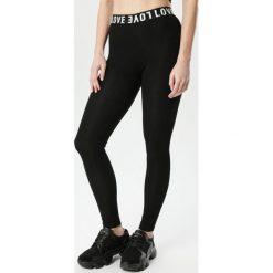 Czarne Legginsy Phithilei. Czarne legginsy sportowe damskie Born2be, s, z nadrukiem, z dzianiny, trekkingowe. Za 39,99 zł.