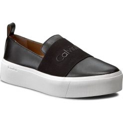 Tenisówki Calvin Klein Jacinta E4745. Brązowe półbuty damskie Calvin Klein, bez wzorów, bez obcasa, bez zapięcia. W wyprzedaży za 429,00 zł.