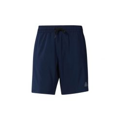 Szorty i Bermudy Reebok Sport Szorty WOR Woven. Niebieskie spodenki i szorty męskie marki Reebok Sport, s, bez wzorów, sportowe. Za 99,95 zł.