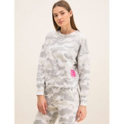 Bluza Calvin Klein Performance Cropped 00GWH9W391. Bluzy damskie Calvin Klein Performance, s, bez wzorów, z bawełny, bez rękawów, bez kaptura. W wyprzedaży za 299,00 zł.