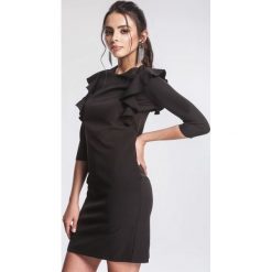 Czarna Sukienka More Valuable. Czarne sukienki damskie other, xl, bez wzorów, z tkaniny, z okrągłym kołnierzem, bez rękawów, mini, trapezowe. Za 79,99 zł.