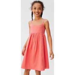 Mango Kids - Sukienka dziecięca Platy 110-164 cm. Różowe sukienki dziewczęce Mango Kids, bez wzorów, z bawełny, casualowe, bez rękawów, rozkloszowane. W wyprzedaży za 49,90 zł.