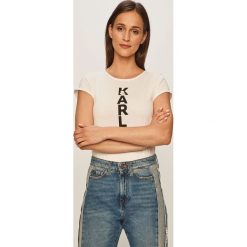 Karl Lagerfeld - T-shirt. Czarne bluzki damskie KARL LAGERFELD, s, z nadrukiem, z bawełny, casualowe, z okrągłym kołnierzem, z krótkim rękawem. Za 299,90 zł.