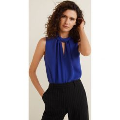 Mango - Top Blanca4. Niebieskie bluzki damskie Mango, m, bez wzorów, z poliesteru, z okrągłym kołnierzem. W wyprzedaży za 49,90 zł.