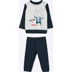 Blukids - Dres dziecięcy 68-98 cm. Niebieskie spodnie chłopięce Blukids, z nadrukiem, z bawełny, długie. W wyprzedaży za 39,90 zł.