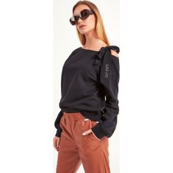 BLUZA LIU JO. Czarne bluzy damskie Liu Jo, s, bez wzorów, z bawełny, bez rękawów, bez kaptura. Za 499,00 zł.