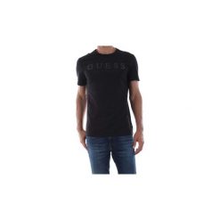 T-shirty z krótkim rękawem Guess M93I55 J1300. Czarne t-shirty męskie Guess, s, z aplikacjami, bez kołnierzyka, krótkie. Za 111,81 zł.