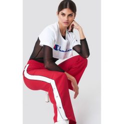 Trendyol Spodnie z zatrzaskami - Red. Czerwone spodnie damskie Trendyol. Za 121,95 zł.