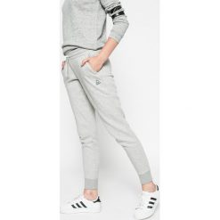Reebok - Spodnie. Szare spodnie damskie Reebok, s, z bawełny. W wyprzedaży za 129,90 zł.