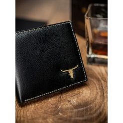 Portfel męski skórzany RFID Buffalo Wild czarny - Czarny. Czarne portfele męskie BUFFALO WILD, bez wzorów, ze skóry. Za 49,99 zł.