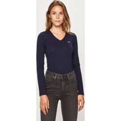 Lacoste - Longsleeve. Czarne bluzki damskie Lacoste, bez wzorów, z elastanu, bez kołnierzyka, z długim rękawem. W wyprzedaży za 199,90 zł.