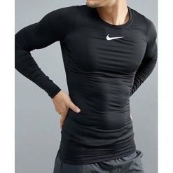 Nike Koszulka męska M NP WM Top LS Comp L czarna r. XL (838044 010). Czerwone koszulki sportowe męskie marki Nike, s, z poliesteru. Za 129,00 zł.