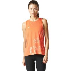 Adidas Koszulka Logo TR pomarańczowa r. L (BP8412). Brązowe topy sportowe damskie marki Adidas, l. Za 102,29 zł.