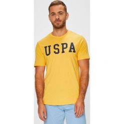 U.S. Polo - T-shirt. Pomarańczowe koszulki polo męskie marki U.S. Polo, l, z nadrukiem, z bawełny. W wyprzedaży za 99,90 zł.