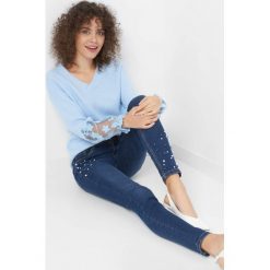 Jegginsy z perłami. Niebieskie legginsy Orsay, s, z bawełny. Za 99,99 zł.