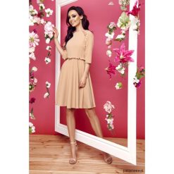 Kobieca sukienka z falbankami L291 -ciepły beż. Sukienki damskie Pakamera, l, bez wzorów, eleganckie, z falbankami, bez rękawów, midi. Za 180,00 zł.