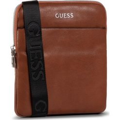 Saszetka GUESS - Scala HMSCAL P0424 BRO. Pomarańczowe torby męskie skórzane Guess, z aplikacjami, ze skóry ekologicznej, młodzieżowe. Za 349,00 zł.