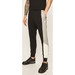 Nike Sportswear - Spodnie. Czarne spodnie męskie Nike Sportswear, m, bez wzorów, z bawełny. Za 189,90 zł.