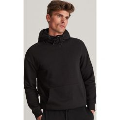 Bluza basic z bawełną organiczną - Czarny. Czarne bluzy męskie Reserved, s, bez wzorów, z bawełny, bez kołnierzyka, bez rękawów, bez kaptura. W wyprzedaży za 69,99 zł.