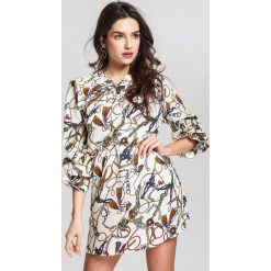 Kremowa Sukienka Brash. Brązowe sukienki damskie other, na lato, xl, bez wzorów, bez kołnierzyka, bez rękawów, midi. Za 69,99 zł.