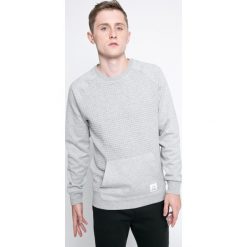 Reebok - Bluza. Szare bluzy męskie Reebok, xl, z nadrukiem, z elastanu, z okrągłym kołnierzem. W wyprzedaży za 129,90 zł.