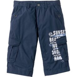 Długie bermudy bojówki Loose Fit bonprix ciemnoniebieski. Niebieskie spodenki i szorty męskie bonprix, m, bez wzorów, długie. Za 109,99 zł.