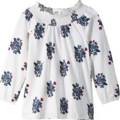 Shirt z dekoltem carmen bonprix biało-niebieski indygo. Białe bluzki dziewczęce bonprix, z nadrukiem, bez kołnierzyka, z długim rękawem, długie, bez kaptura. Za 32,99 zł.