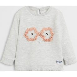 Mango Kids - Bluza dziecięca Rose 80-104 cm. Szare bluzy dziewczęce Mango Kids, z aplikacjami, z bawełny, bez rękawów, bez kaptura. W wyprzedaży za 47,90 zł.