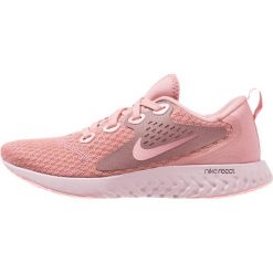 Nike Performance LEGEND REACT Obuwie do biegania treningowe rust pink/pink tint/smokey mauve/sail. Czerwone buty do biegania damskie marki Nike Performance, z materiału. Za 419,00 zł.